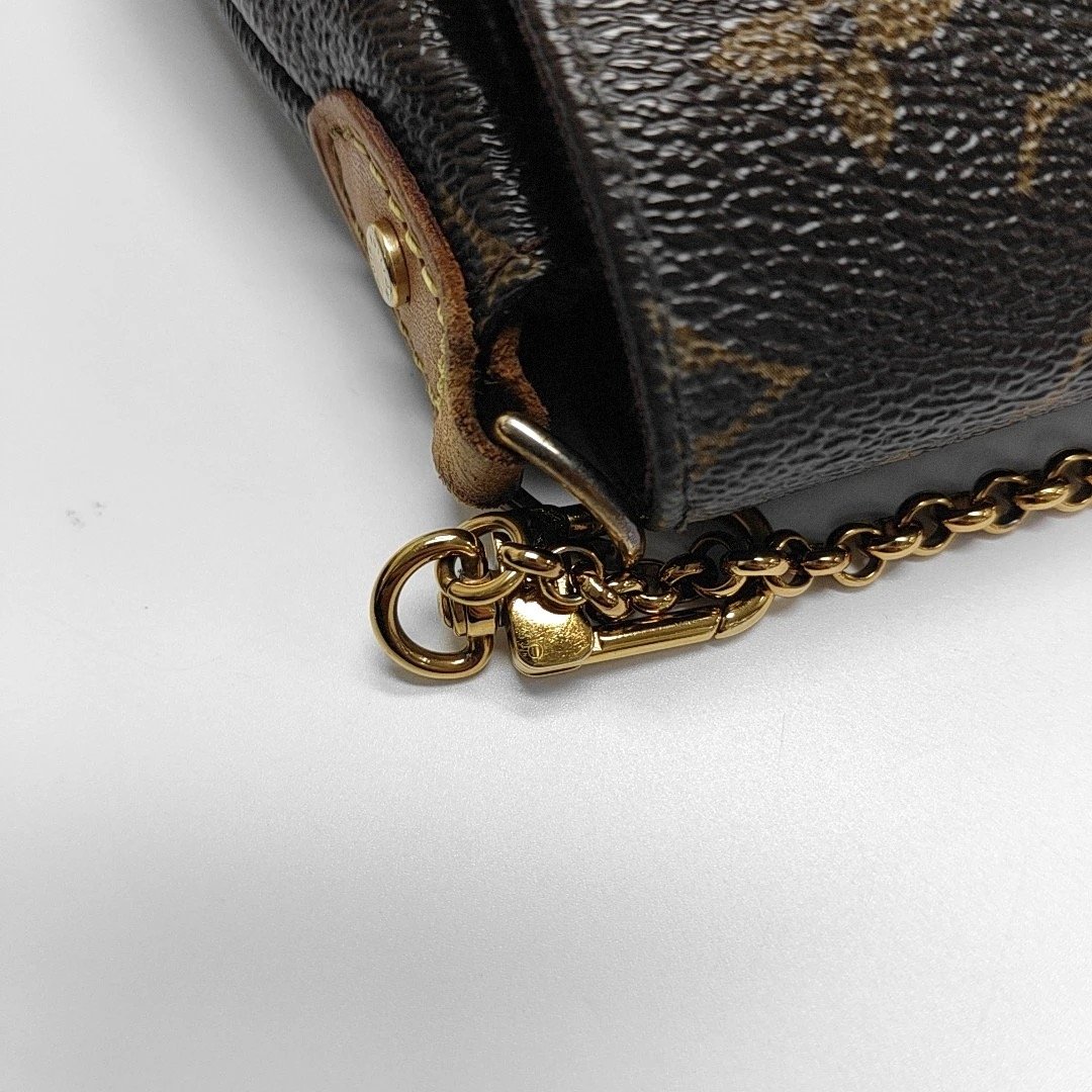 LOUIS VUITTON FAVORITE medium-sized brown coated canvas vintage handbag with gold hardware (90% New)