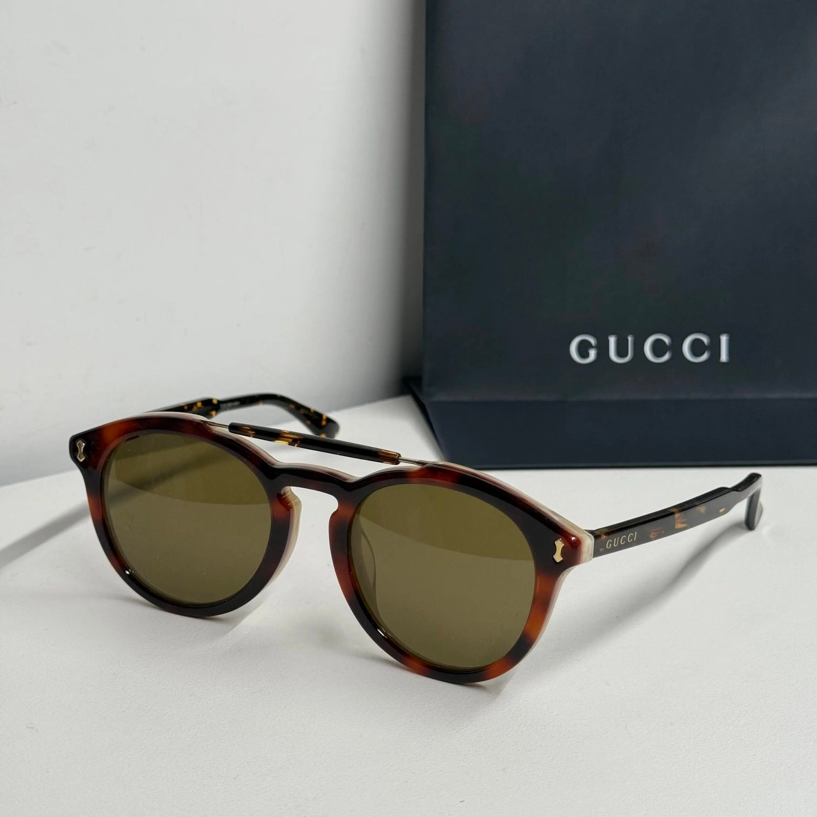 GUCCI dark brown round acetate sunglasses
