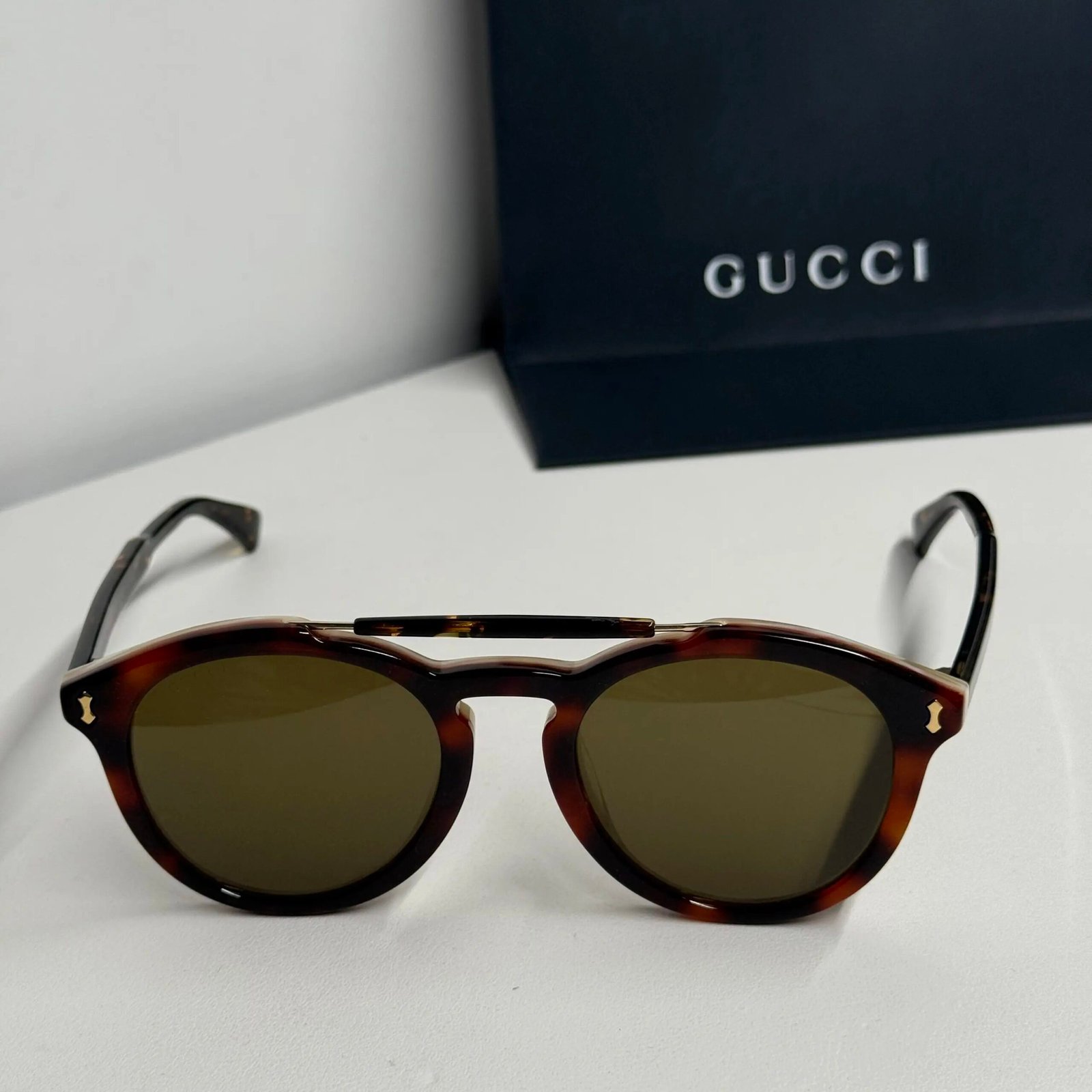 GUCCI dark brown round acetate sunglasses
