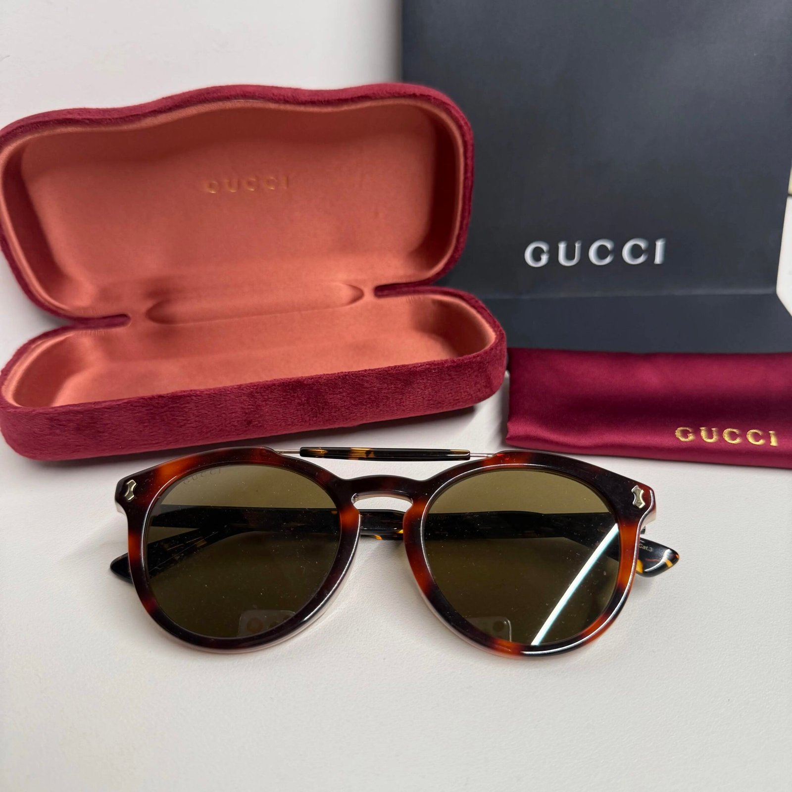 GUCCI dark brown round acetate sunglasses
